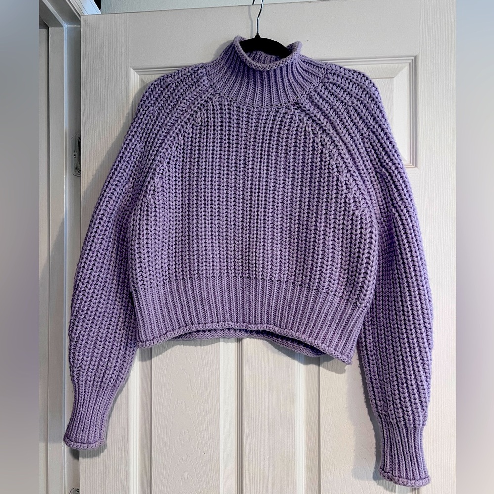 Lavender mock neck sweater.
